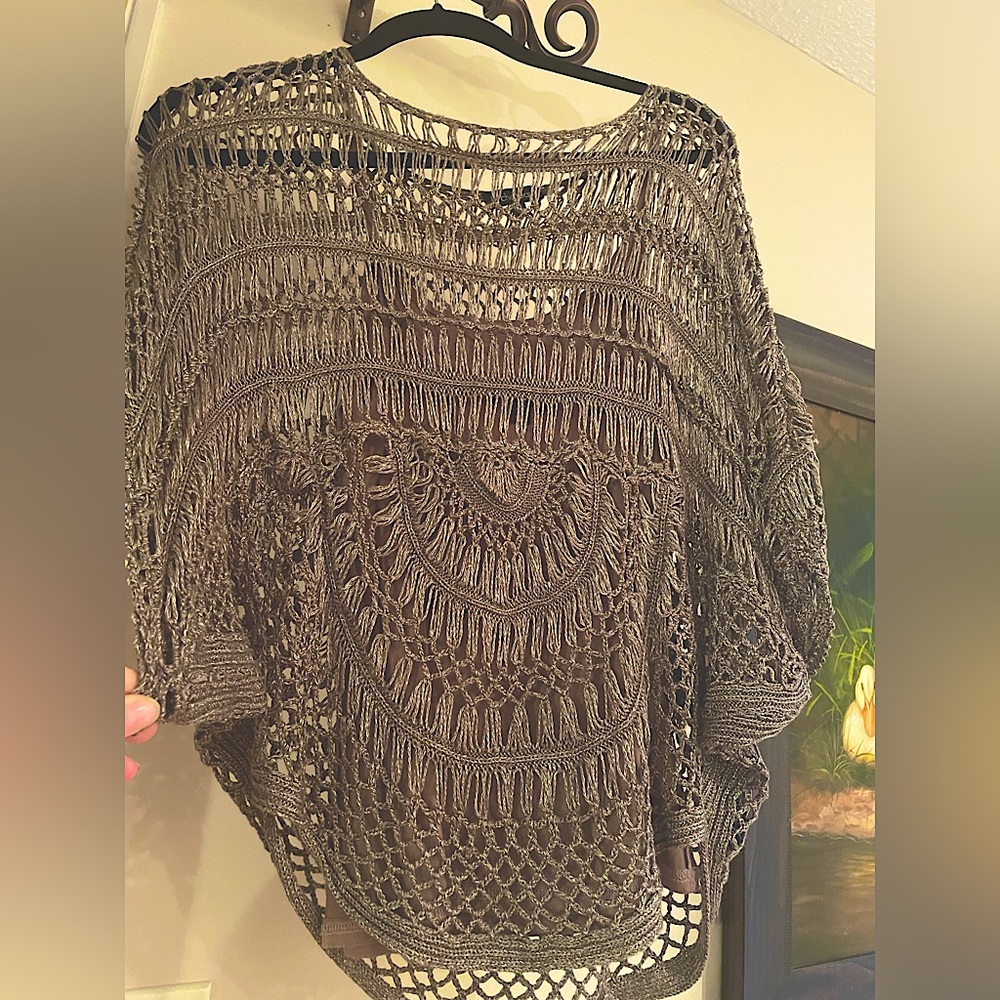 Le Chateau poncho style crochet shirt.